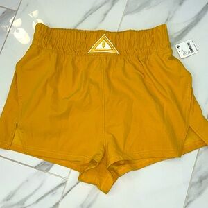 Free People movement seating sunflowers shorts. NEW. Medium.